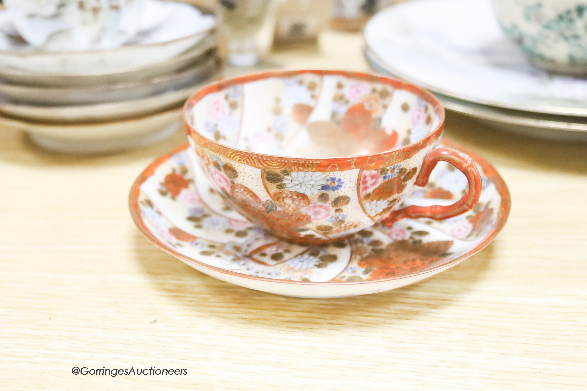 A group of various Japanese Meiji period cup and saucers